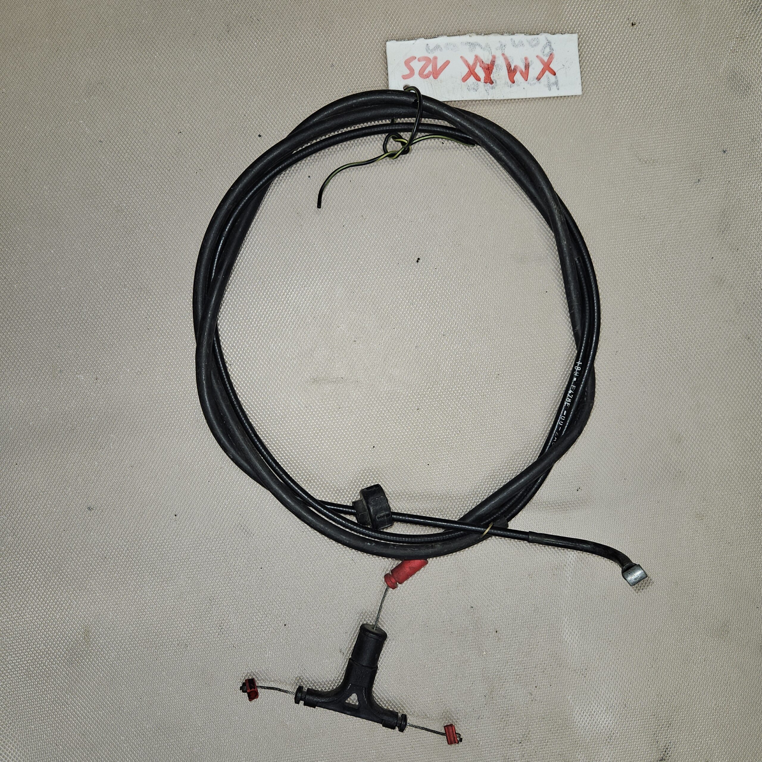 Câble d’ouverture de coffre d’occasion Yamaha 125 X-MAX 2010 – Pièce d’origine