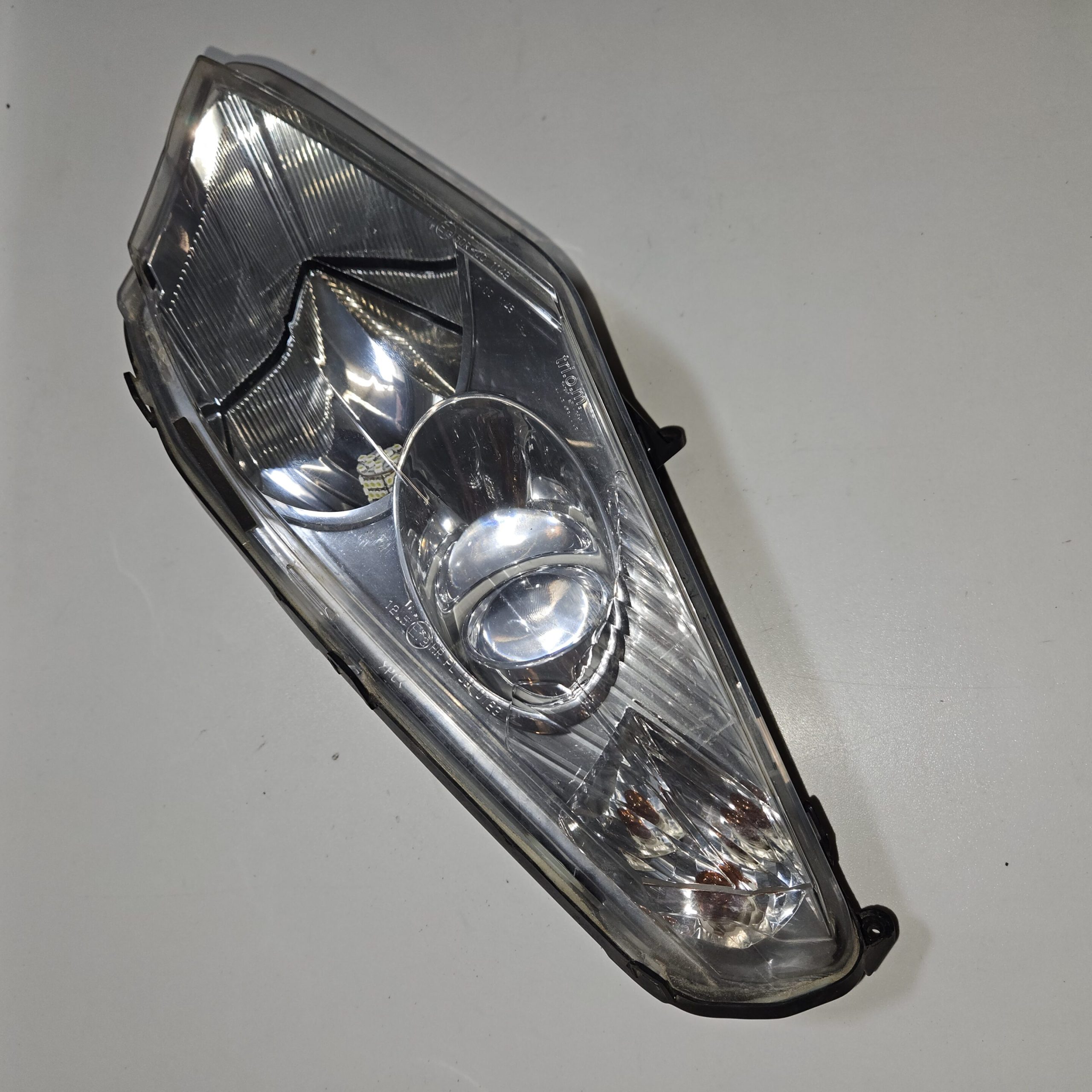 Phare avant gauche Peugeot 125 Satelis 2010 d’occasion